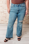 ONLINE EXCLUSIVE: Isla Mid Rise Distressed Released Hem Bootcut Jeans