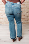 ONLINE EXCLUSIVE: Isla Mid Rise Distressed Released Hem Bootcut Jeans