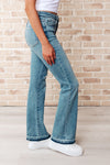 ONLINE EXCLUSIVE: Isla Mid Rise Distressed Released Hem Bootcut Jeans