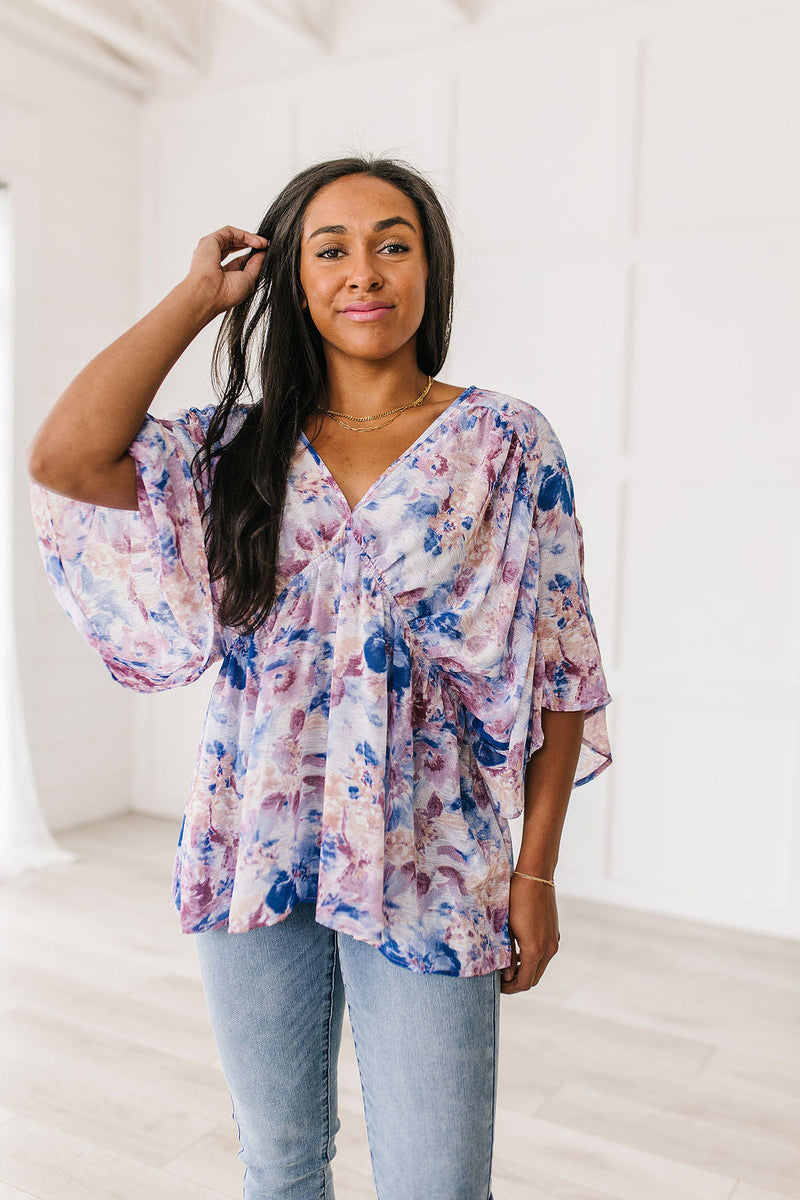 ONLINE EXCLUSIVE: Fabled in Floral Draped Peplum Top in Blue
