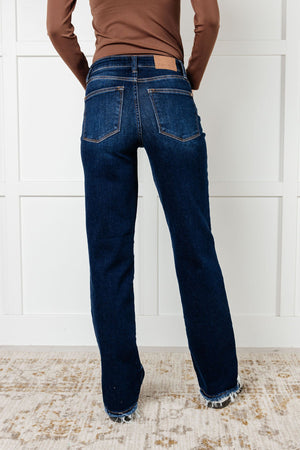 ONLINE EXCLUSIVE: Jacqueline Mid Rise Frayed Hem Straight Leg Jean